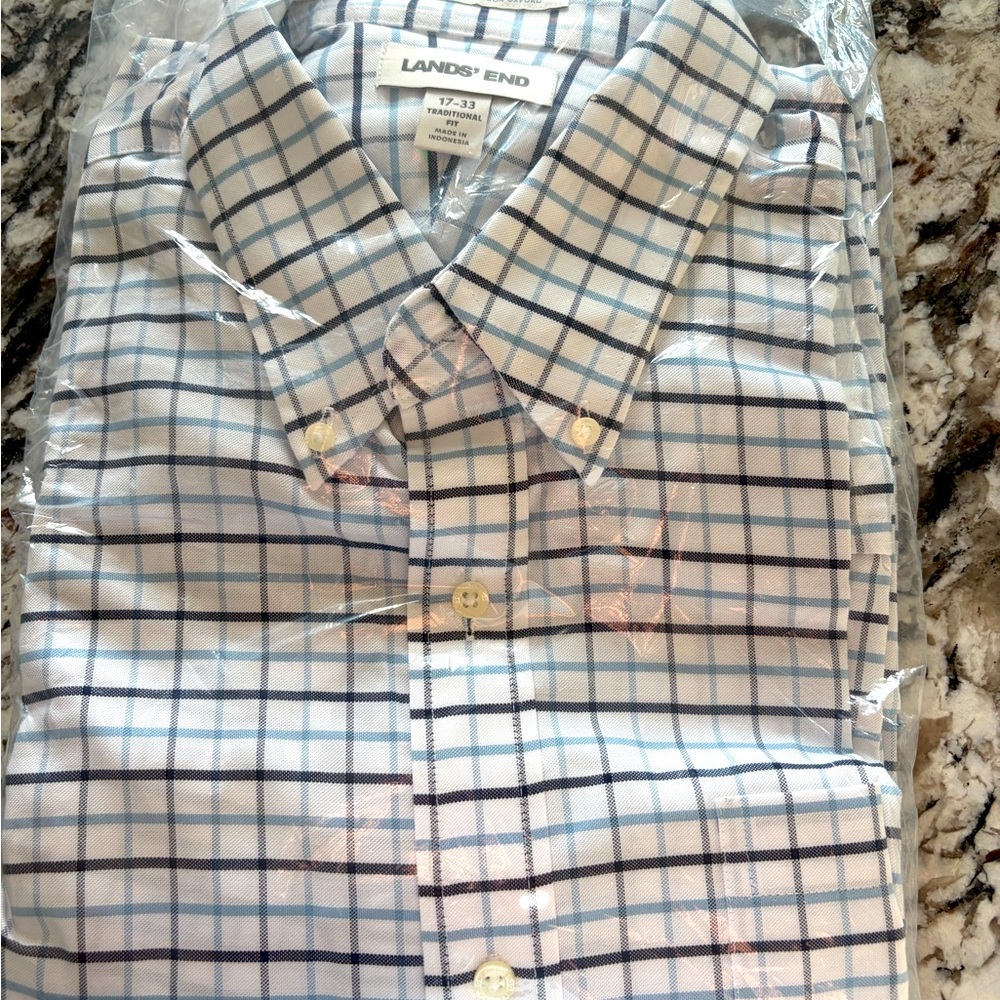 Unworn men’s dress shirt from Lands End. No iron